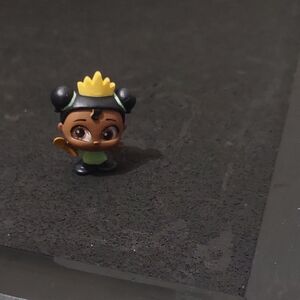 USED DISNEY DOORABLES (YOUNG TIANA) SIZE 1 1/2 HAS IMPREFECTIONS (COMMON)